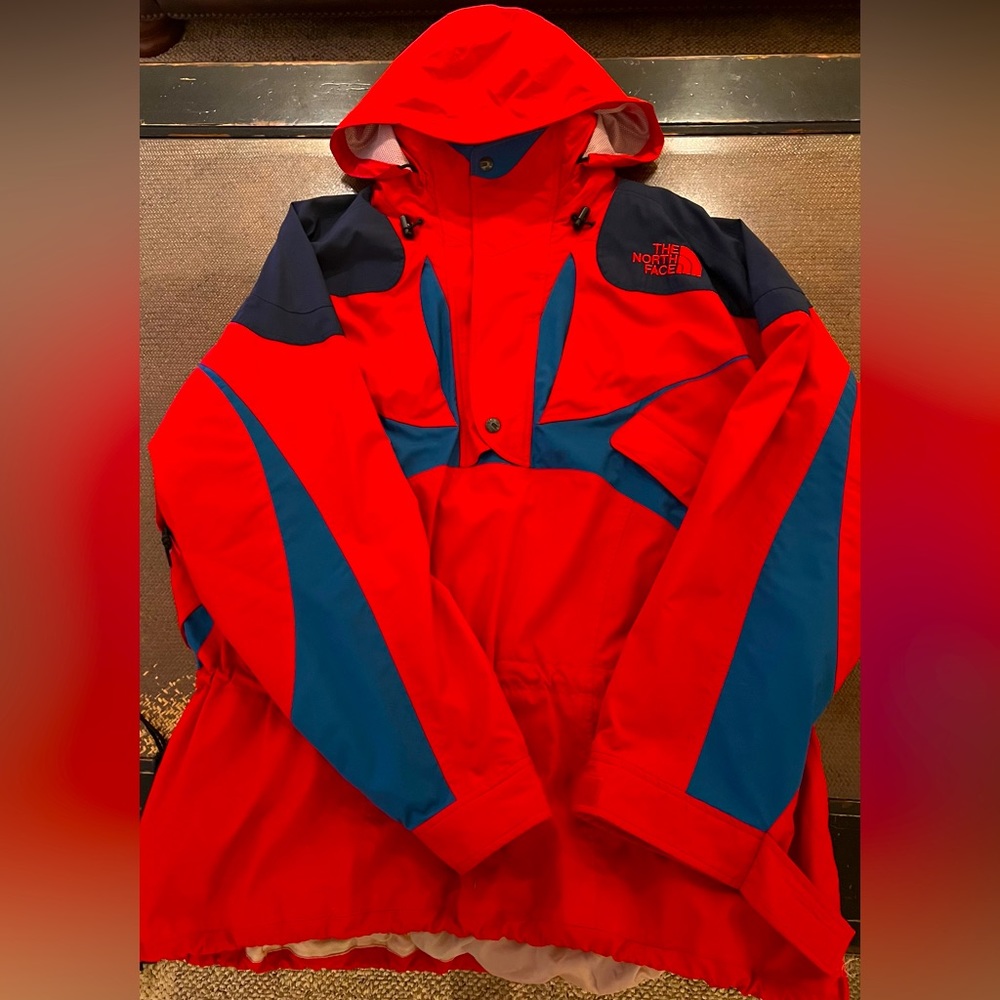 A Mens North Face Extreme Weather pullover